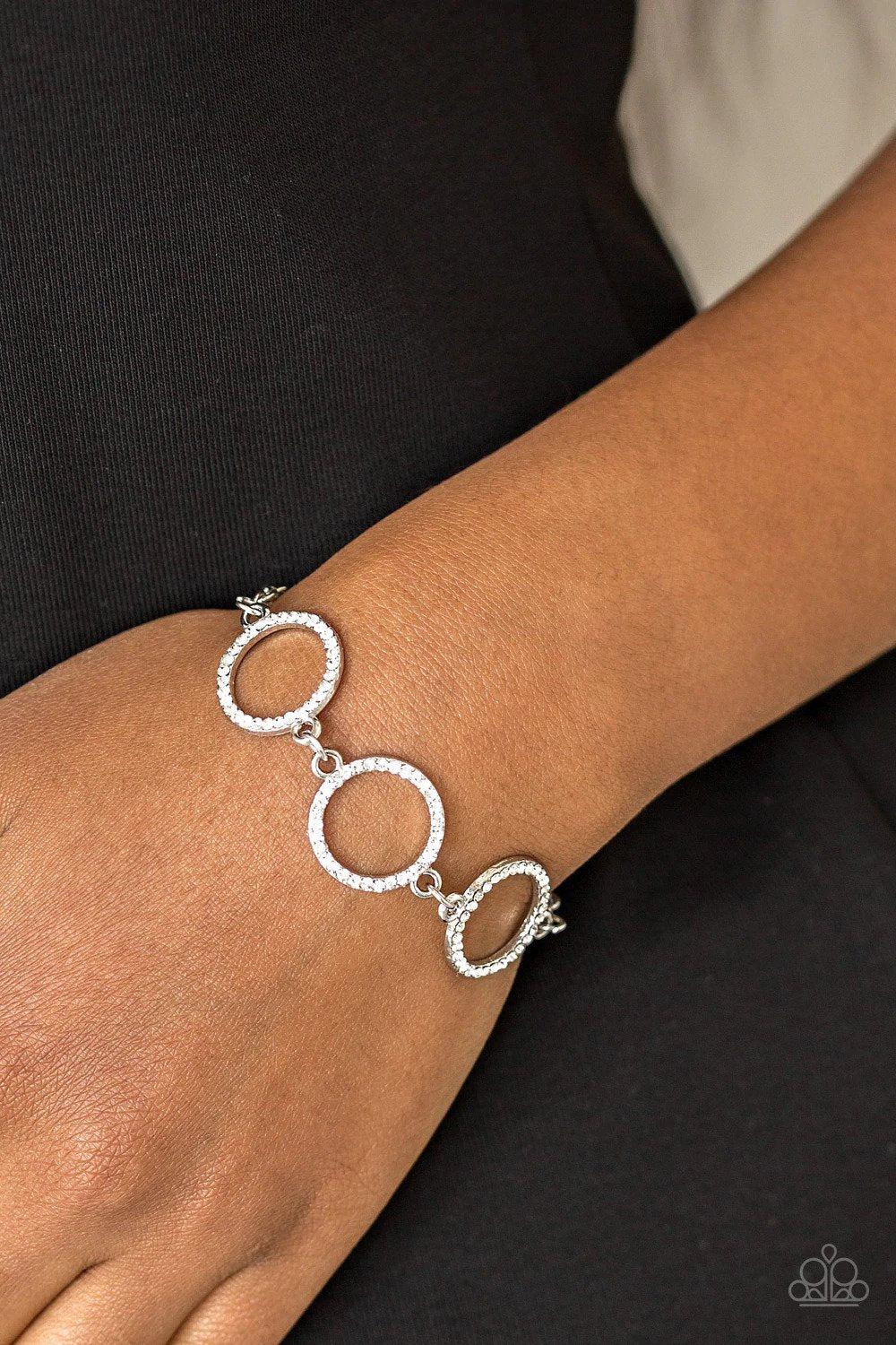 Dress The Part White Rhinestone Bracelet - Paparazzi Accessories- on model - CarasShop.com - Paparazzi Jewelry by Cara Jewels