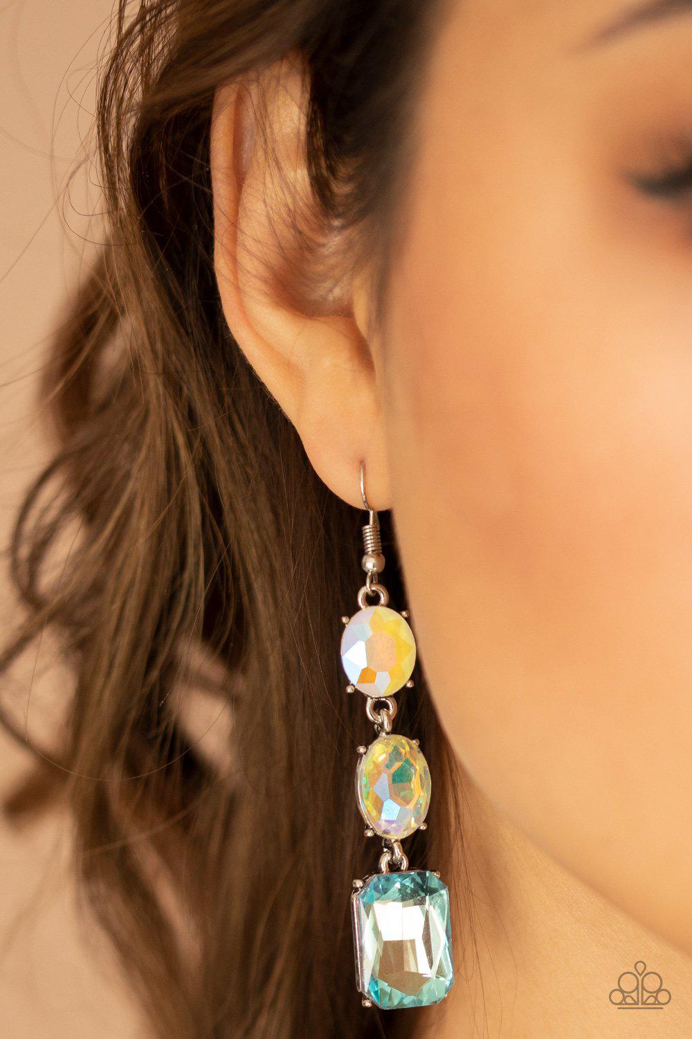 Dripping In Melodrama Blue Iridescent Rhinestone Earrings - Paparazzi Accessories- on model - CarasShop.com - Paparazzi Jewelry by Cara Jewels