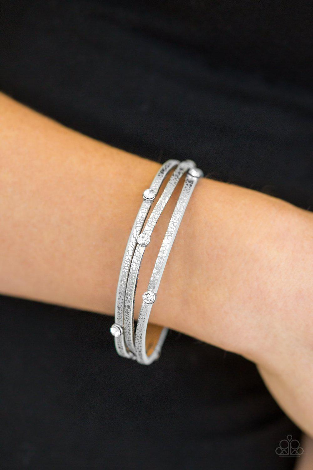 Drop A Shine Silver Urban Wrap Snap Bracelet - Paparazzi Accessories- on model - CarasShop.com - Paparazzi Jewelry by Cara Jewels