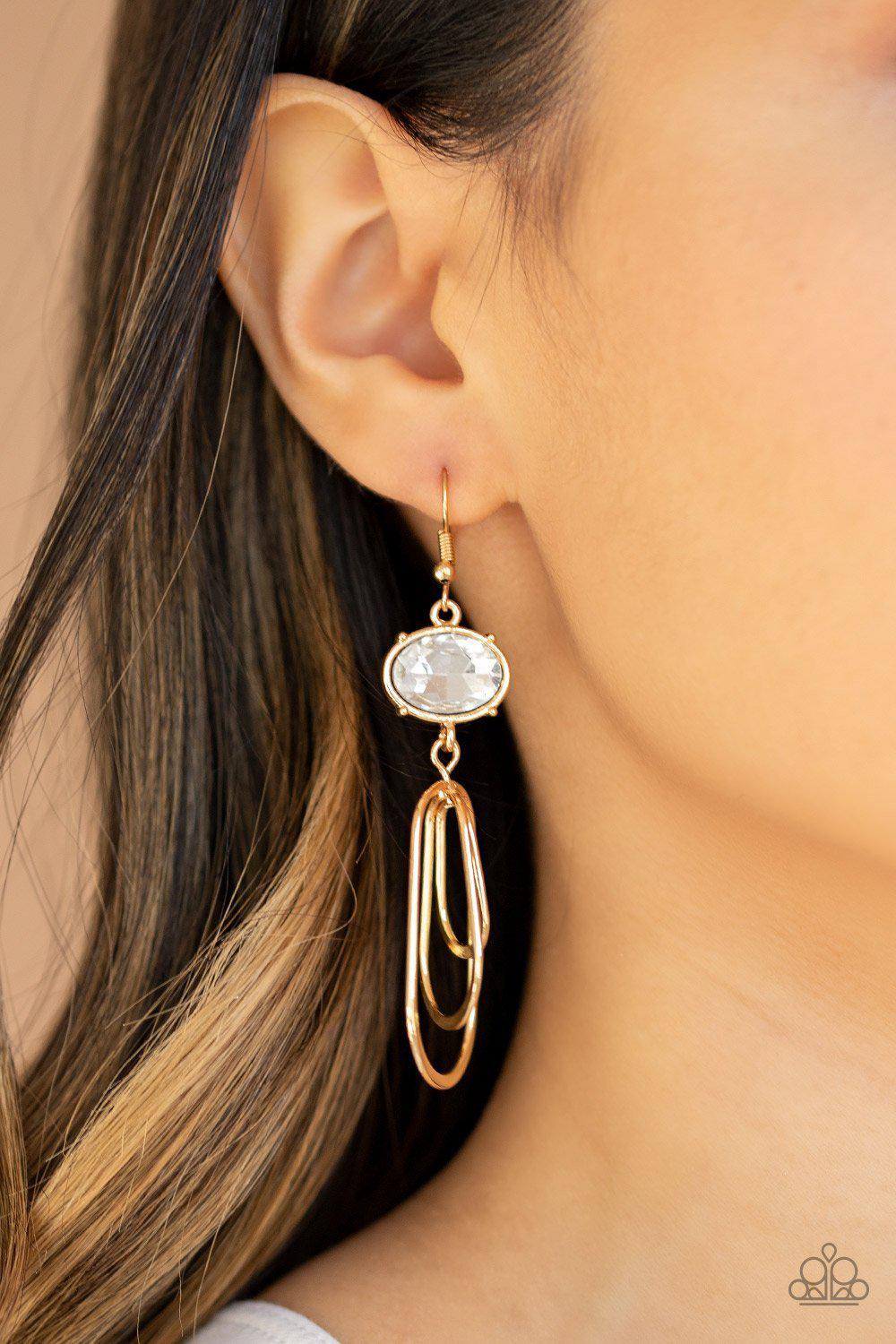 Drop-Dead Glamorous Gold and White Rhinestone Earrings - Paparazzi Accessories- on model - CarasShop.com - Paparazzi Jewelry by Cara Jewels