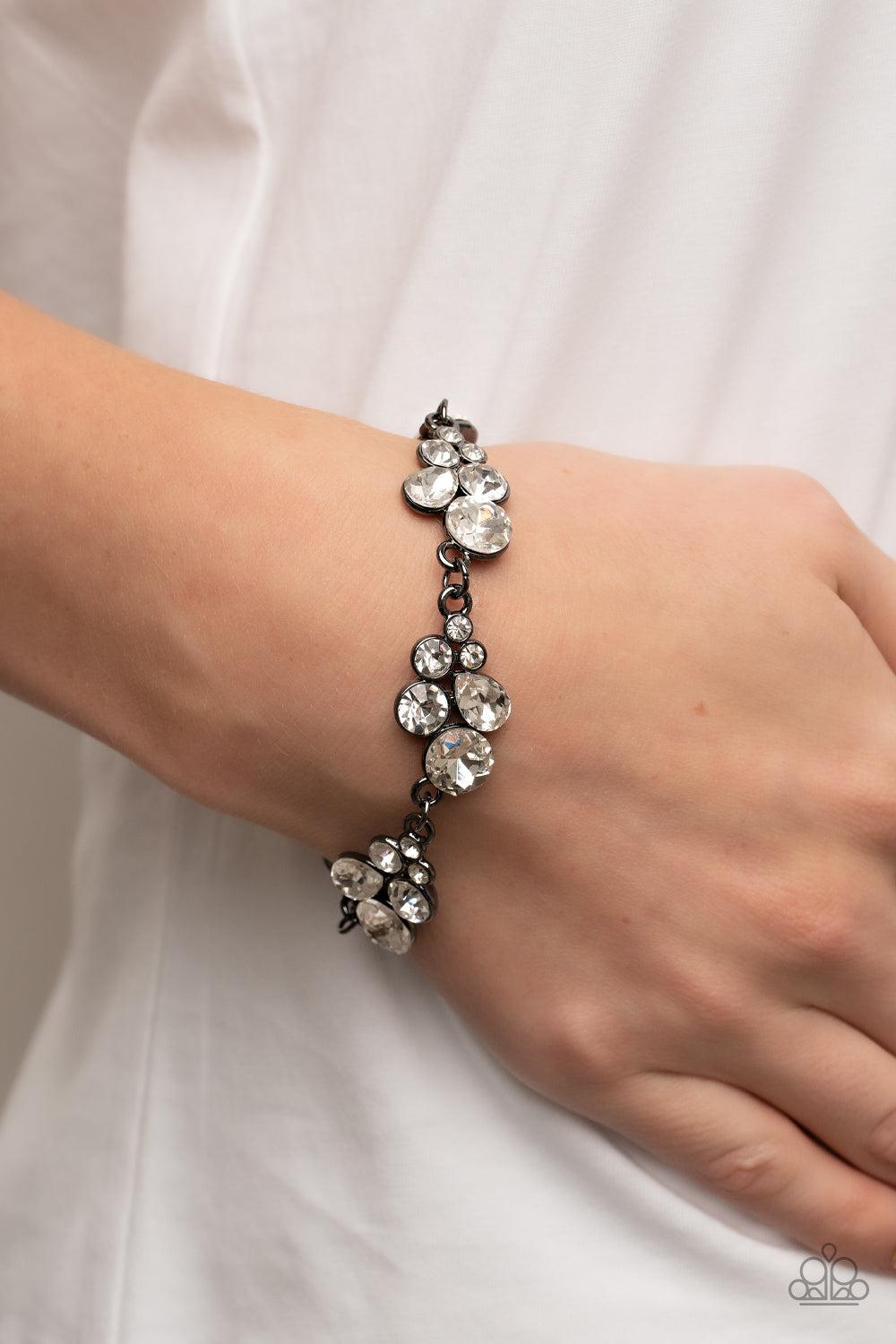 Duchess Dowry Gunmetal Black & White Rhinestone Bracelet - Paparazzi Accessories- on model - CarasShop.com - Paparazzi Jewelry by Cara Jewels