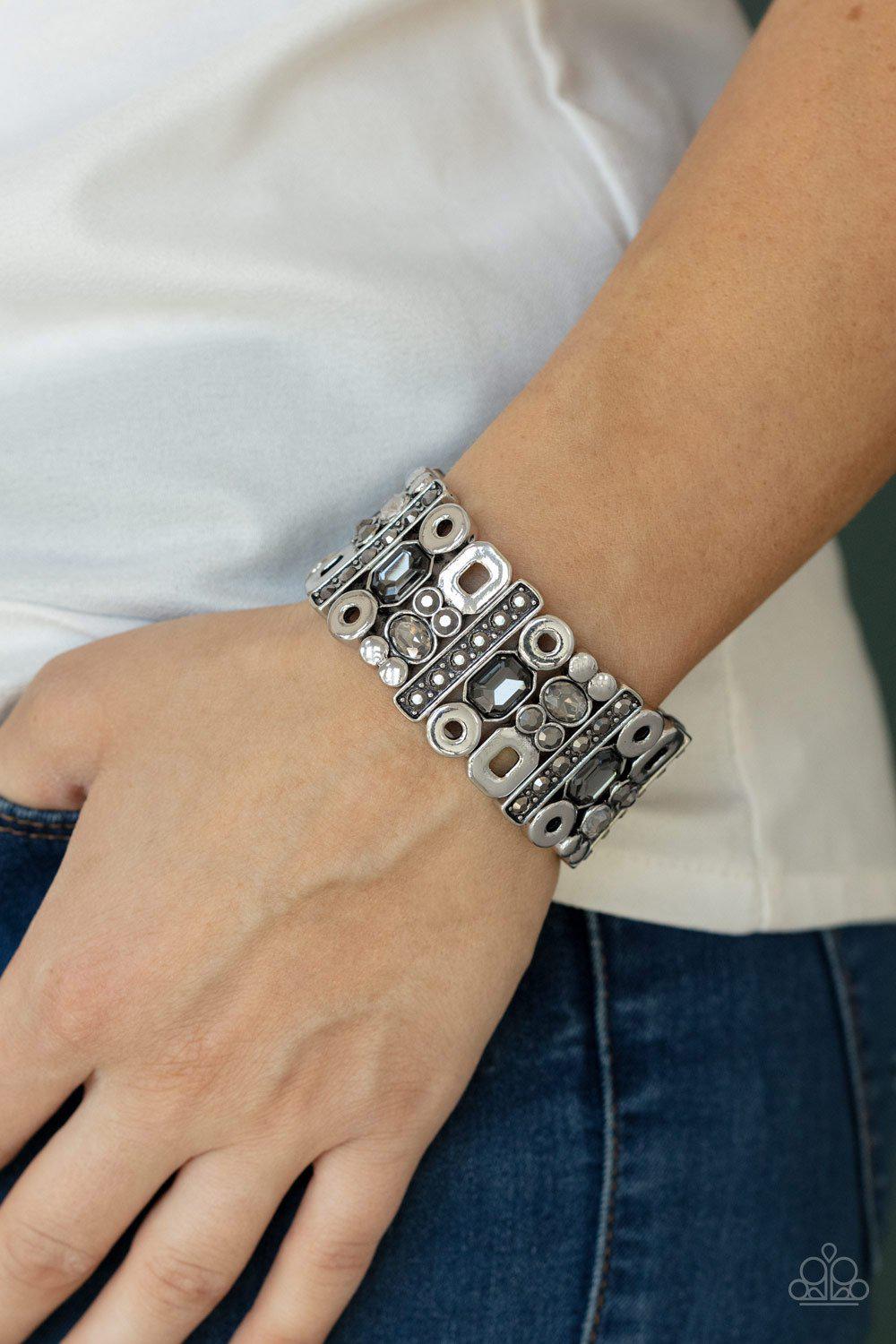 Dynamically Diverse Silver Hematite and Smoky Rhinestone Bracelet - Paparazzi Accessories- on model - CarasShop.com - Paparazzi Jewelry by Cara Jewels