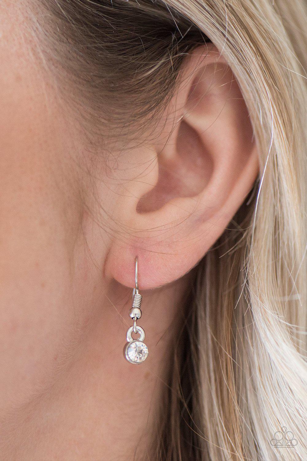 Easy Money White Rhinestone and Silver Ribbon Necklace - Paparazzi Accessories - free matching earrings -CarasShop.com - Paparazzi Jewelry by Cara Jewels