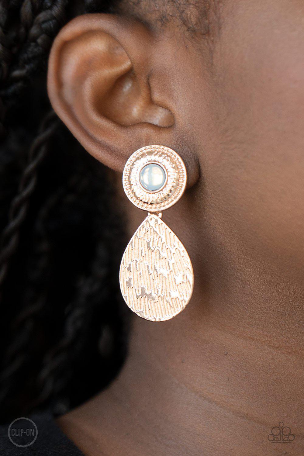 Emblazoned Edge Rose Gold and Opal Clip-On Earrings - Paparazzi Accessories- on model - CarasShop.com - Paparazzi Jewelry by Cara Jewels