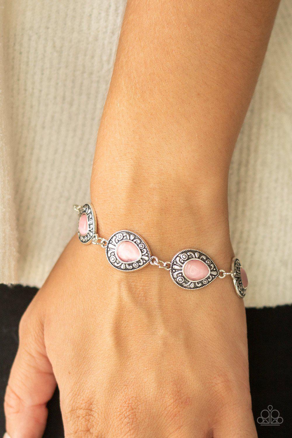 Enchantingly Ever After Pink Cat's Eye Stone Bracelet - Paparazzi Accessories- on model - CarasShop.com - Paparazzi Jewelry by Cara Jewels