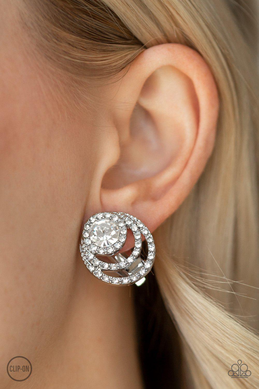 Epic Epicenter White Rhinestone Clip-On Earrings - Paparazzi Accessories- on model - CarasShop.com - Paparazzi Jewelry by Cara Jewels