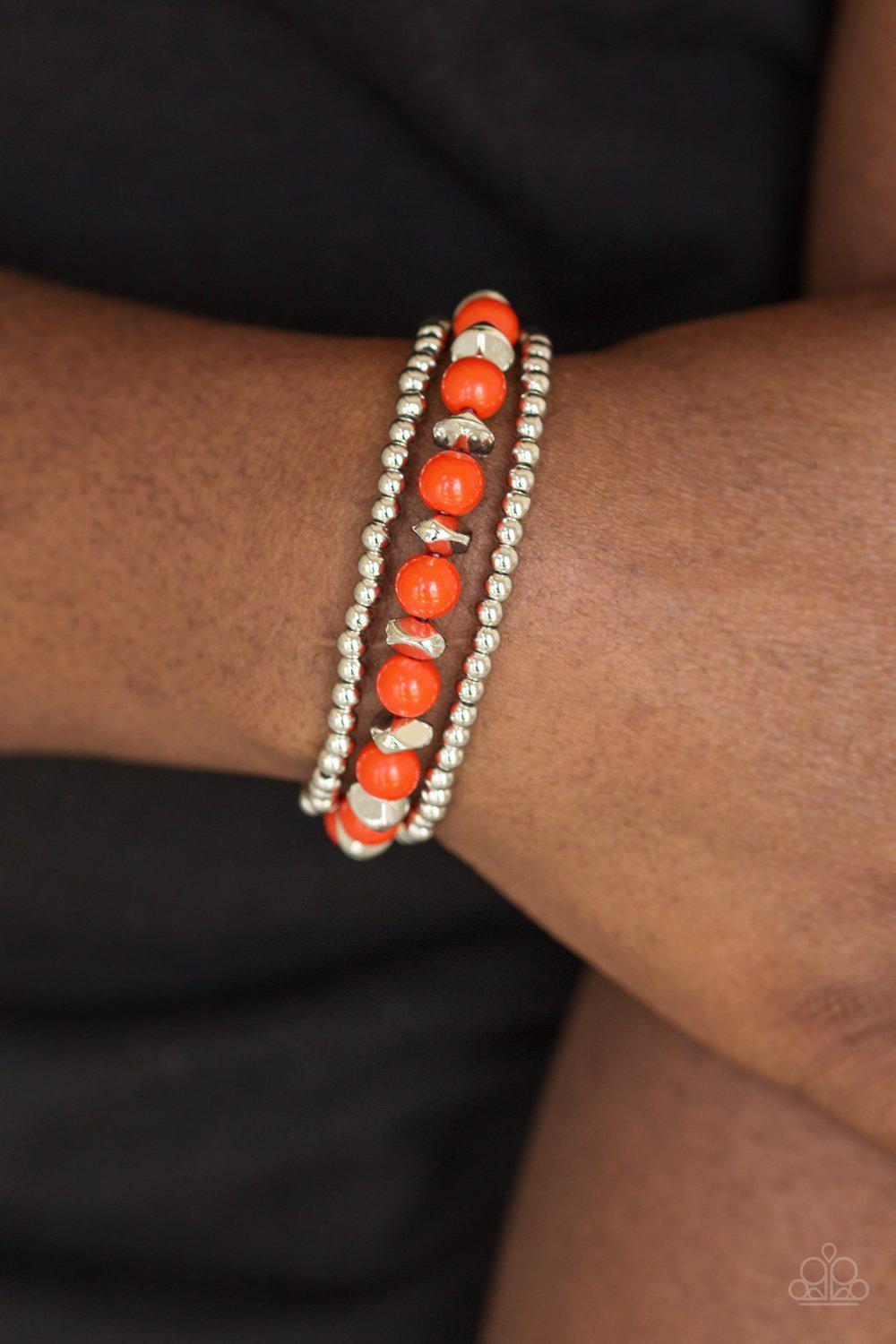 Epic Escape Orange and Silver Stretch Bracelet Set - Paparazzi Accessories- on model - CarasShop.com - Paparazzi Jewelry by Cara Jewels