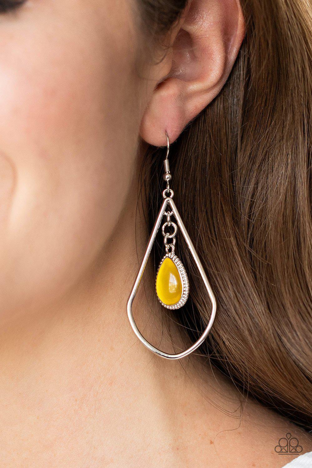 Ethereal Elegance Yellow Cat's Eye Teardrop Earrings - Paparazzi Accessories- on model - CarasShop.com - Paparazzi Jewelry by Cara Jewels