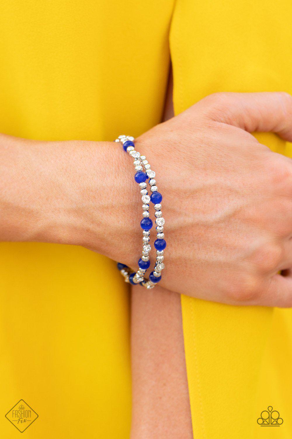 Ethereally Entangled Blue Cat's Eye Stone and Silver Coil Bracelet - Paparazzi Accessories- on model - CarasShop.com - Paparazzi Jewelry by Cara Jewels