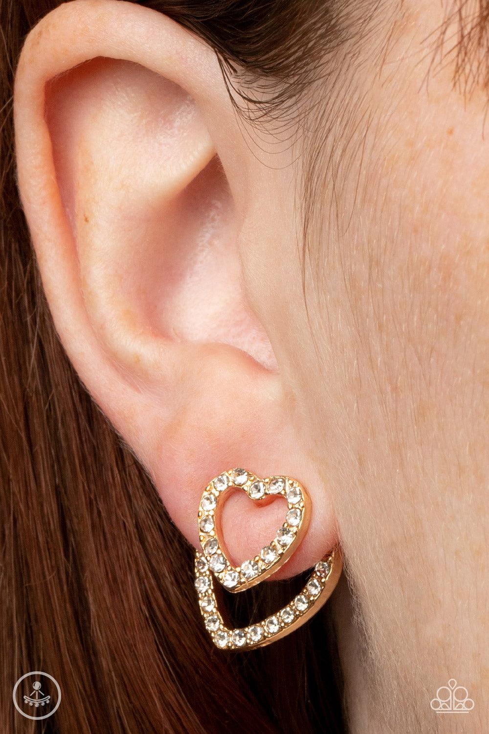 Ever Enamored Gold and White Rhinestone Heart Earrings - Paparazzi Accessories- on model - CarasShop.com - Paparazzi Jewelry by Cara Jewels