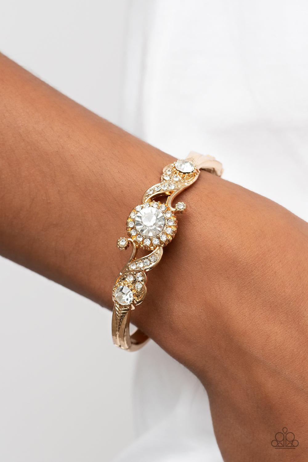 Expert Elegance Gold & White Rhinestone Bracelet - Paparazzi Accessories- on model - CarasShop.com - Paparazzi Jewelry by Cara Jewels