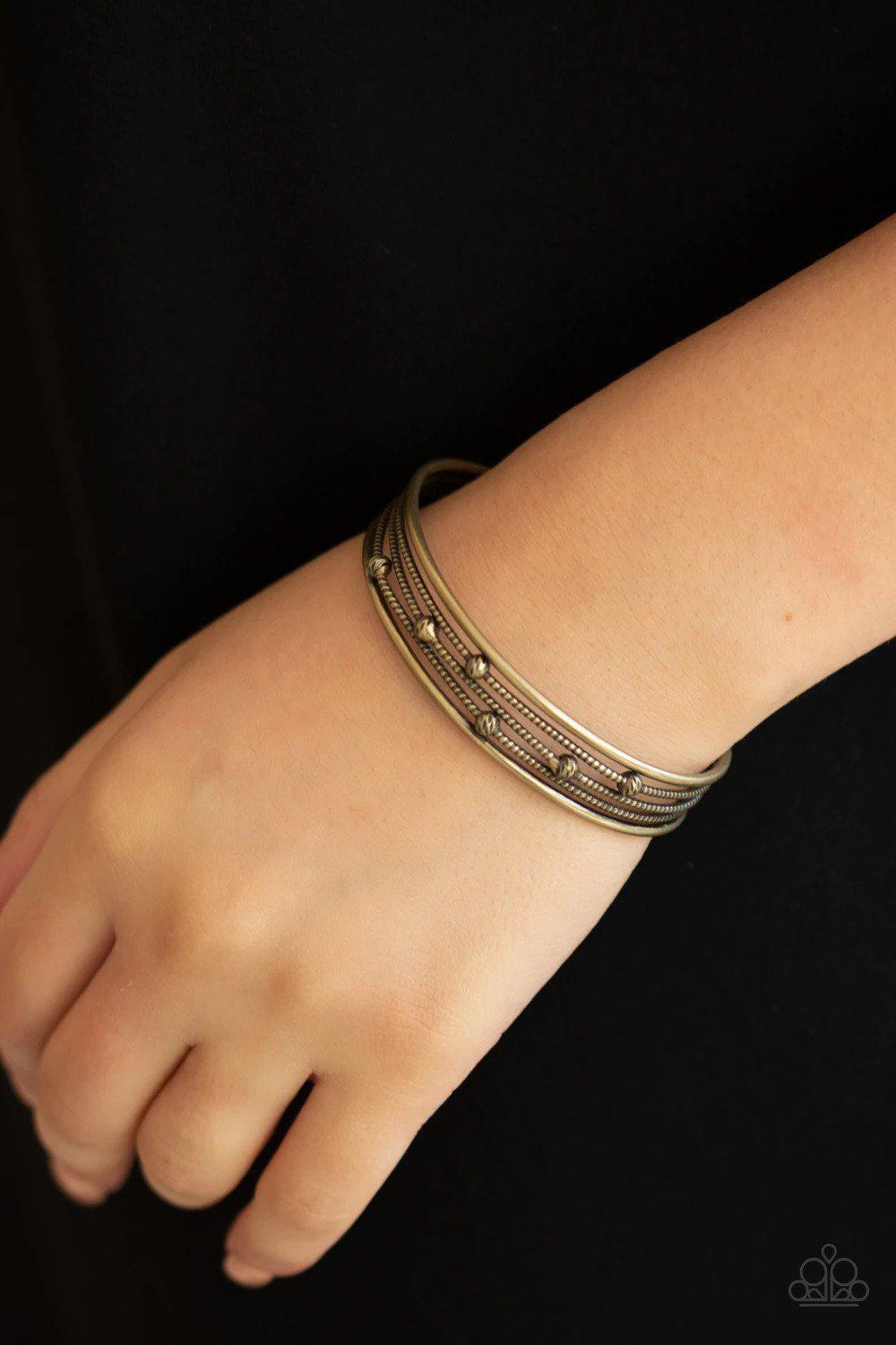 Extra Expressive Brass Cuff Bracelet - Paparazzi Accessories- on model - CarasShop.com - Paparazzi Jewelry by Cara Jewels