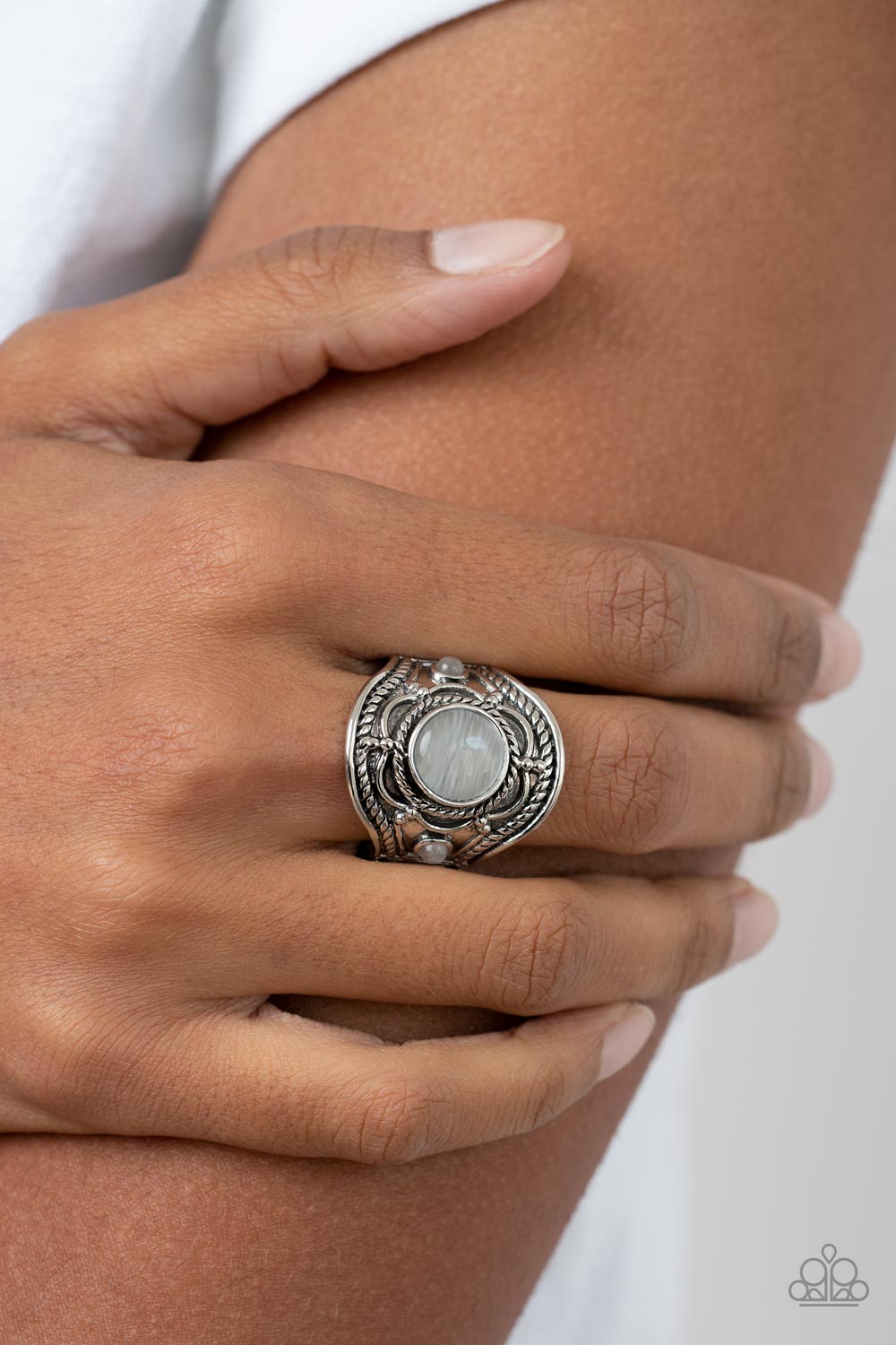 Exuberant Escapade White Cat's Eye Stone Ring - Paparazzi Accessories- on model - CarasShop.com - Paparazzi Jewelry by Cara Jewels
