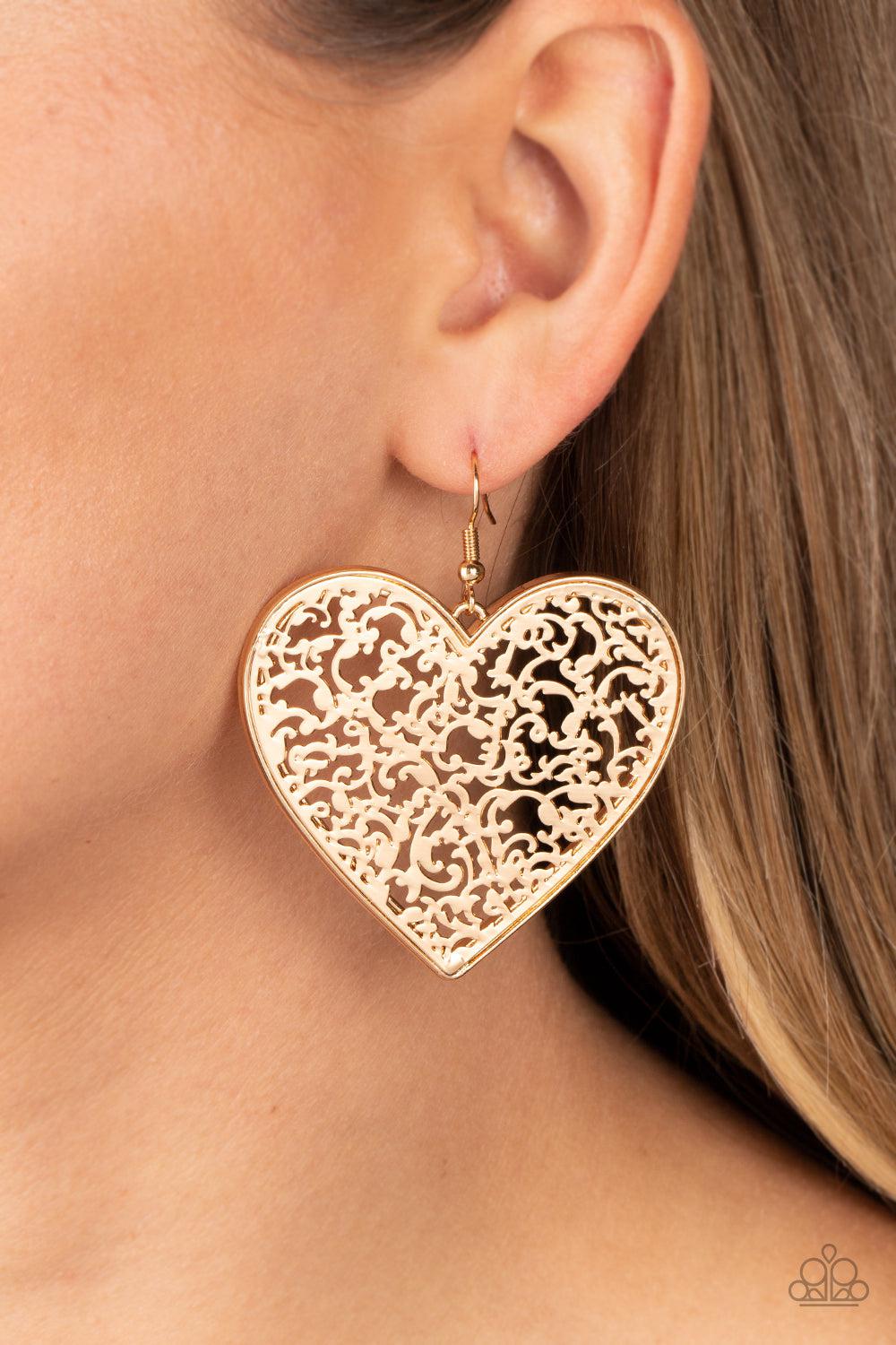 Fairest in the Land Gold Heart Earrings - Paparazzi Accessories- on model - CarasShop.com - Paparazzi Jewelry by Cara Jewels