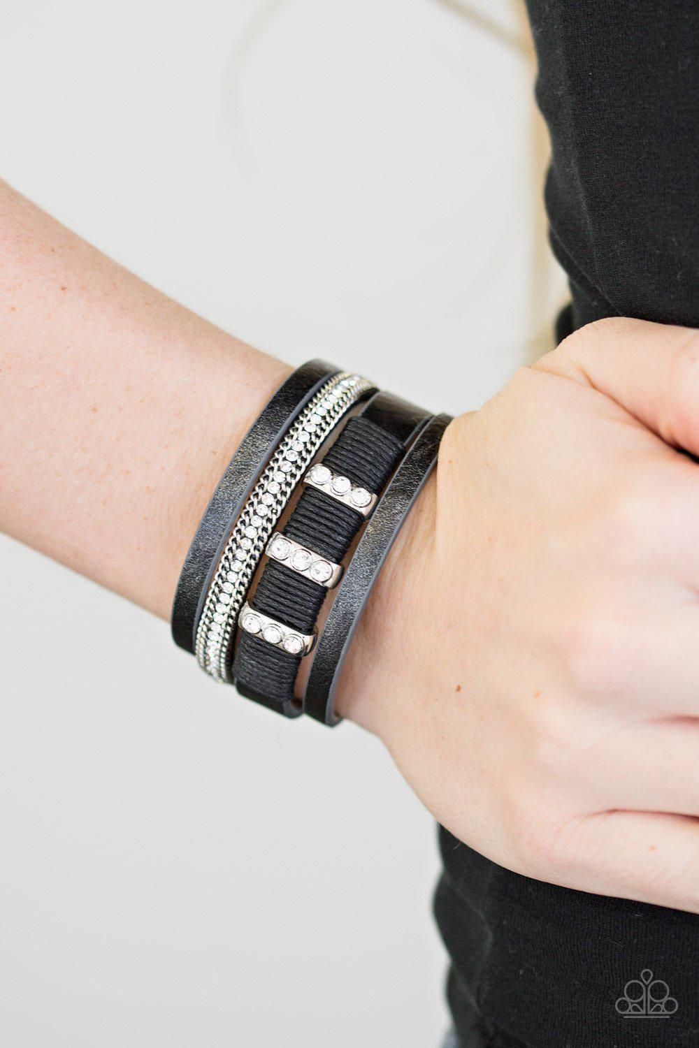 Fame Night Black Leather Bracelet - Paparazzi Accessories- on model - CarasShop.com - Paparazzi Jewelry by Cara Jewels