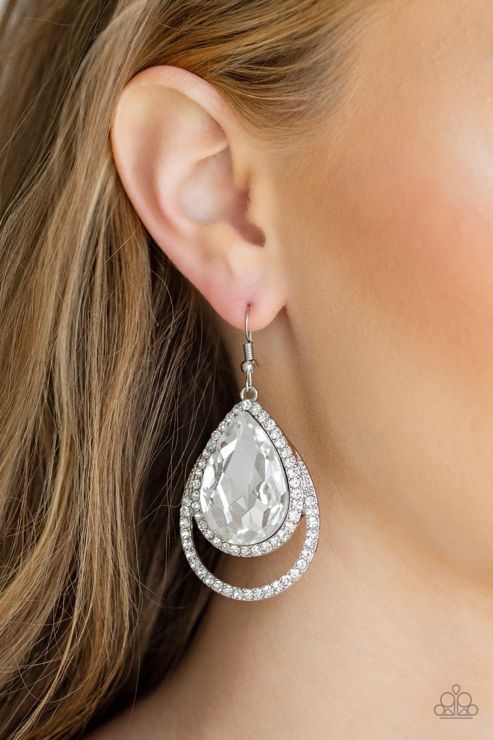Famous White Rhinestone Earrings - Paparazzi Accessories- on model - CarasShop.com - Paparazzi Jewelry by Cara Jewels