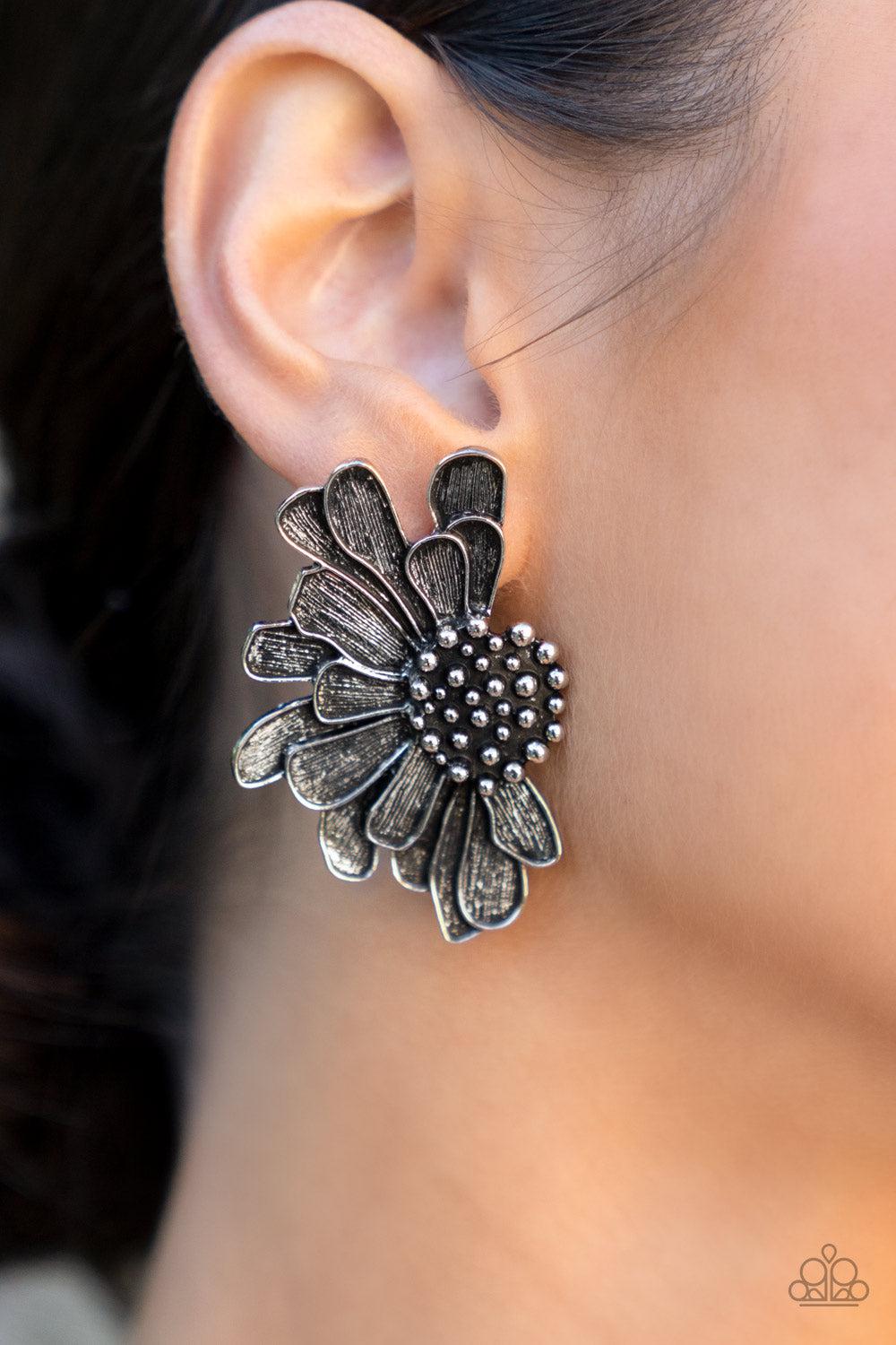 Farmstead Meadow Silver Flower Earrings - Paparazzi Accessories- on model - CarasShop.com - Paparazzi Jewelry by Cara Jewels