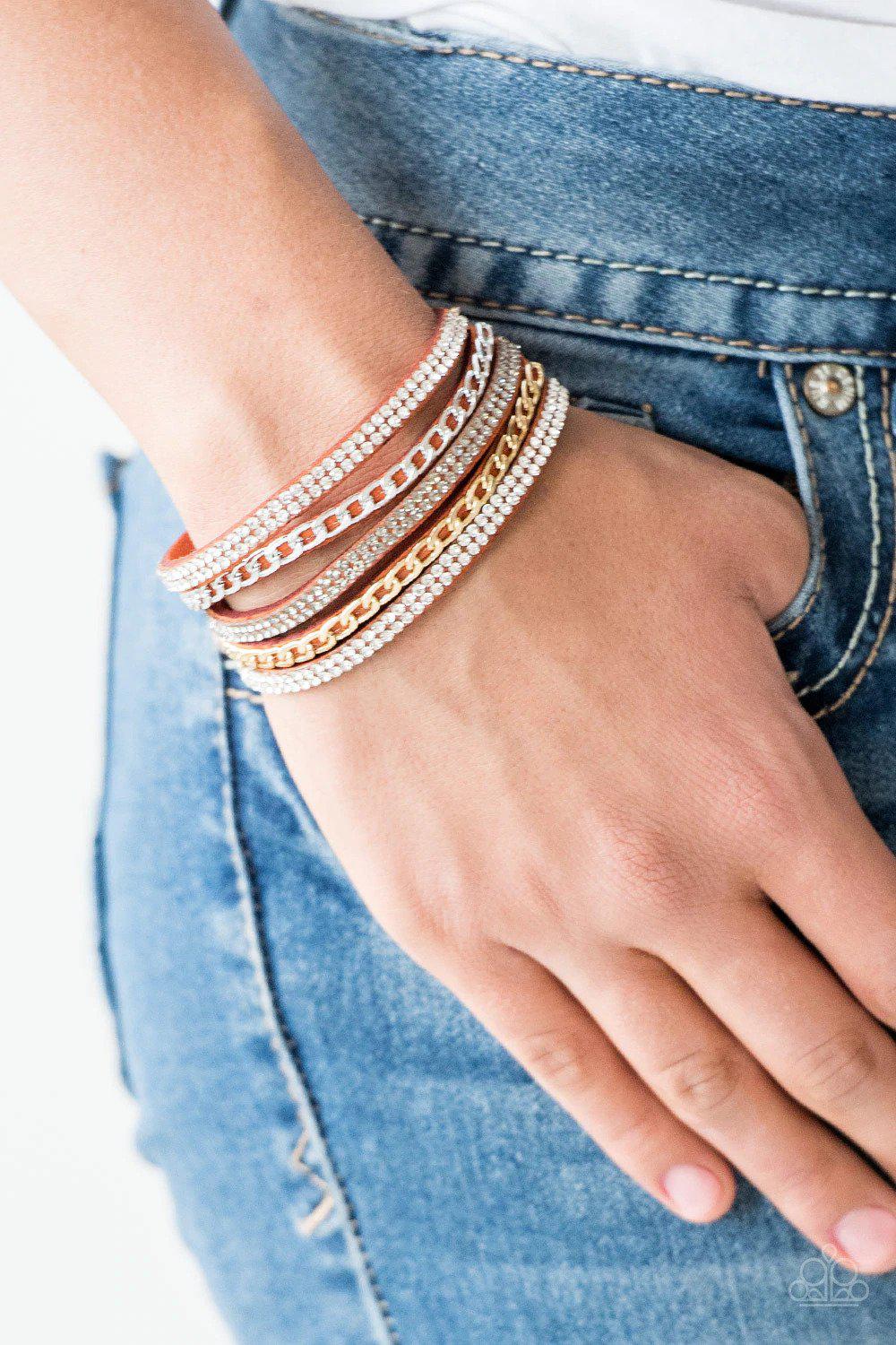 Fashion Fiend Orange Wrap Snap Urban Bracelet - Paparazzi Accessories- on model - CarasShop.com - Paparazzi Jewelry by Cara Jewels