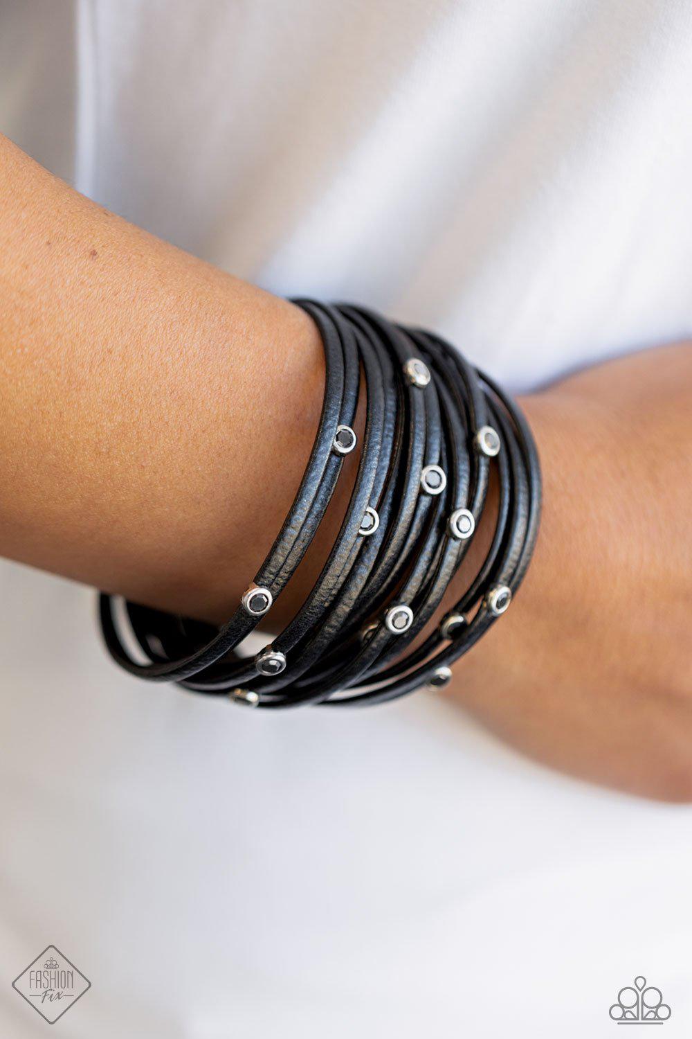 Fearlessly Layered Black Leather and Hematite Rhinestone Magnetic Bracelet - Paparazzi Accessories- on model - CarasShop.com - Paparazzi Jewelry by Cara Jewels