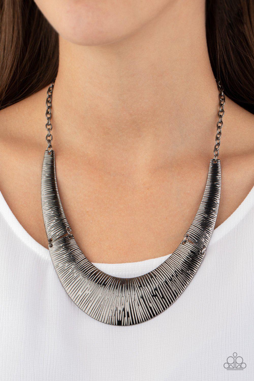 Feast or Famine Gunmetal Black Necklace - Paparazzi Accessories- on model - CarasShop.com - Paparazzi Jewelry by Cara Jewels