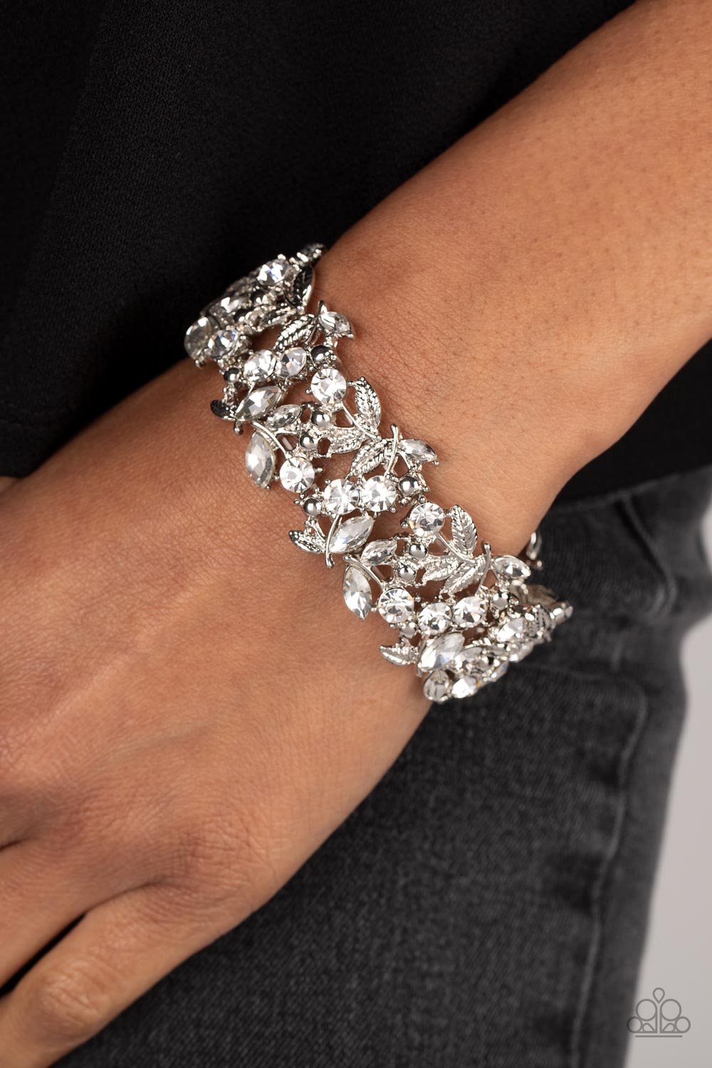 Feathered Finesse White Rhinestone Bracelet - Paparazzi Accessories- on model - CarasShop.com - Paparazzi Jewelry by Cara Jewels