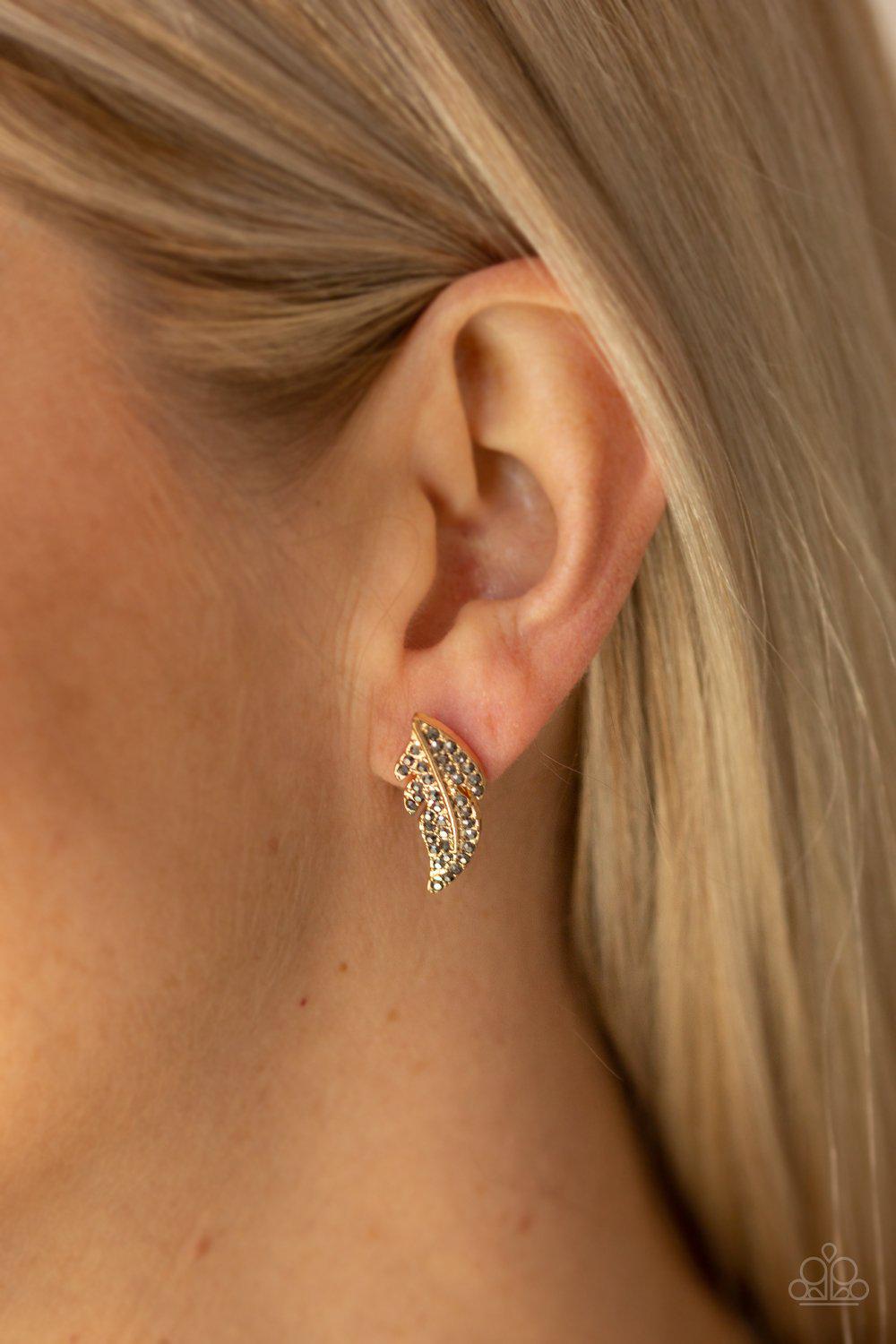 Feathered Fortune Gold and Hematite Post Earrings - Paparazzi Accessories- on model - CarasShop.com - Paparazzi Jewelry by Cara Jewels