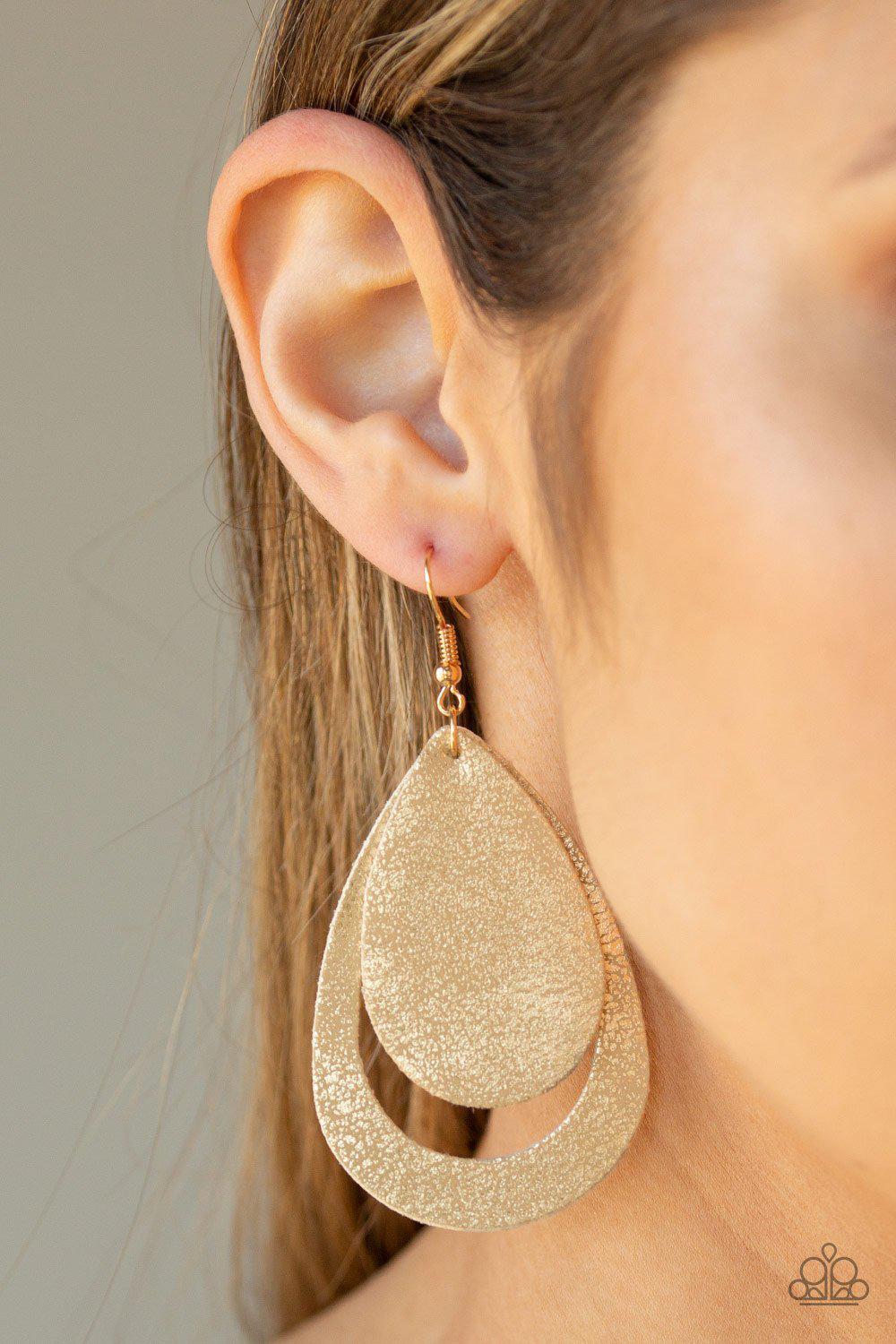 Fiery Firework Gold Leather Earrings - Paparazzi Accessories- on model - CarasShop.com - Paparazzi Jewelry by Cara Jewels