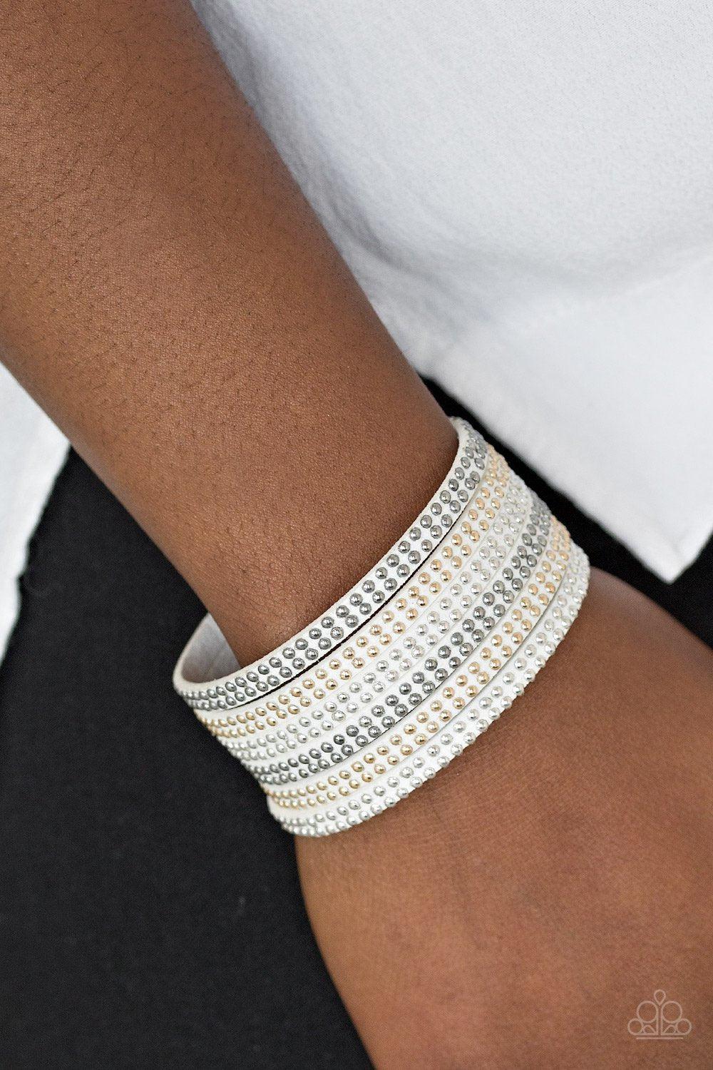 Fight Fire With Fire White Silver and Gold Urban Wrap Snap Bracelet - Paparazzi Accessories- on model - CarasShop.com - Paparazzi Jewelry by Cara Jewels
