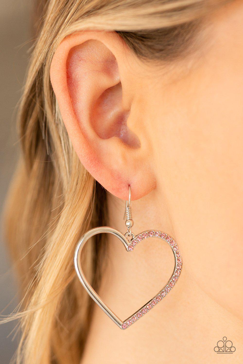 First Date Dazzle Pink Heart Earrings - Paparazzi Accessories- on model - CarasShop.com - Paparazzi Jewelry by Cara Jewels