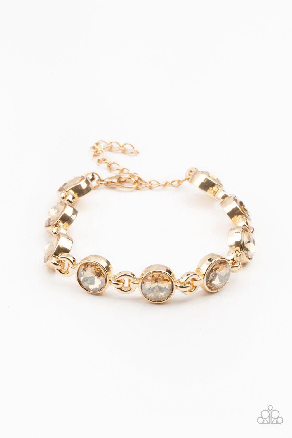 First In Fashion Show Gold Bracelet - Paparazzi Accessories- lightbox - CarasShop.com - Paparazzi Jewelry by Cara Jewels