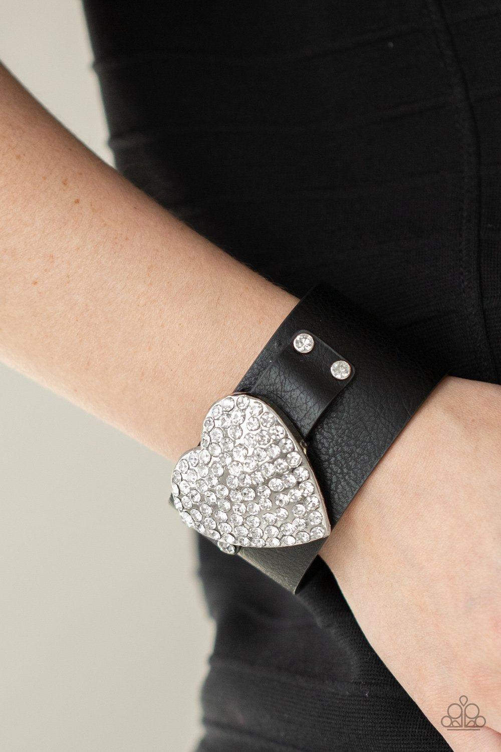 Flauntable Flirt Black Leather and White Rhinestone Heart Wrap Snap Bracelet - Paparazzi Accessories- on model - CarasShop.com - Paparazzi Jewelry by Cara Jewels
