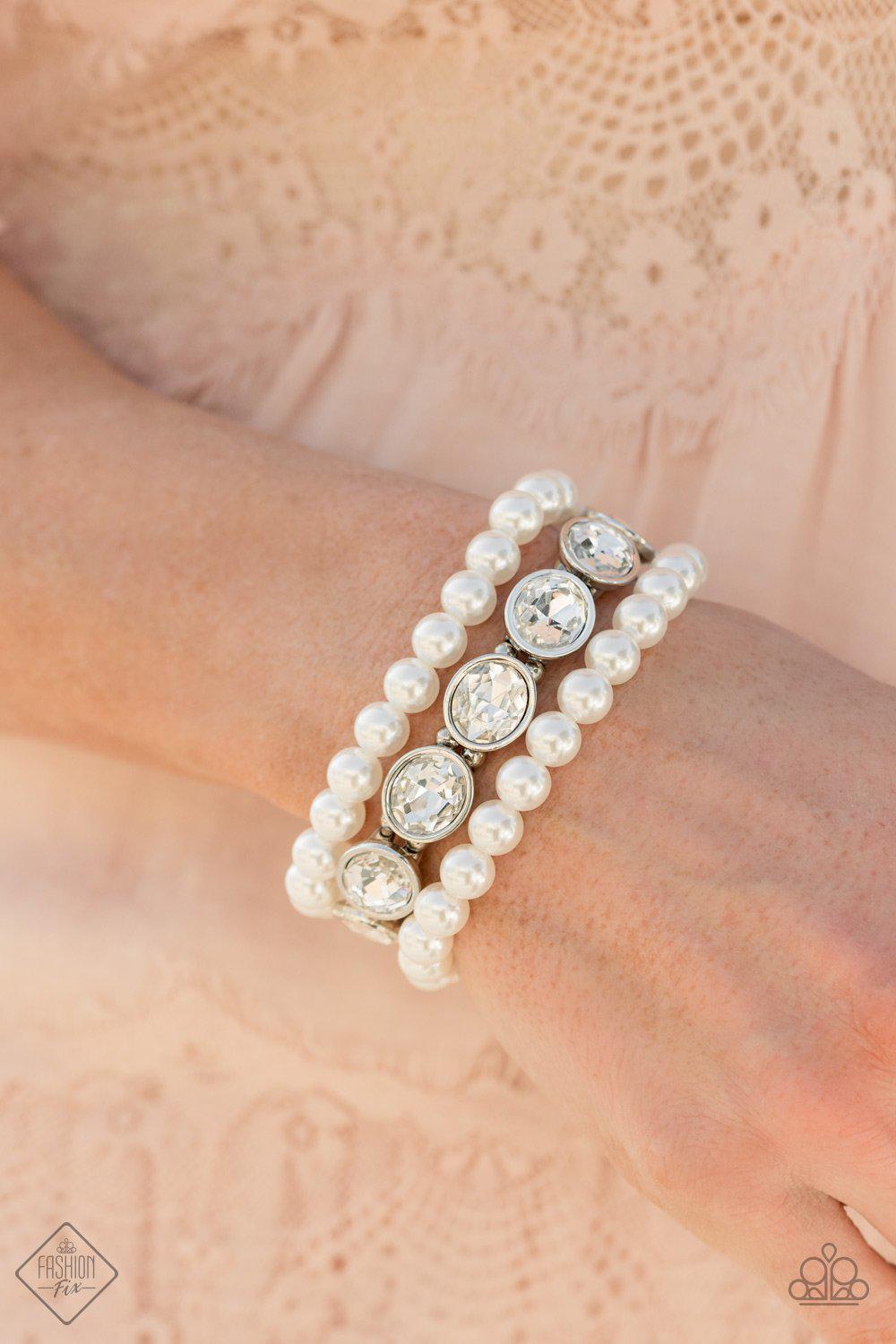 Flawlessly Flattering White Pearl and Rhinestone Stretch Bracelet Set - Paparazzi Accessories- on model - CarasShop.com - Paparazzi Jewelry by Cara Jewels
