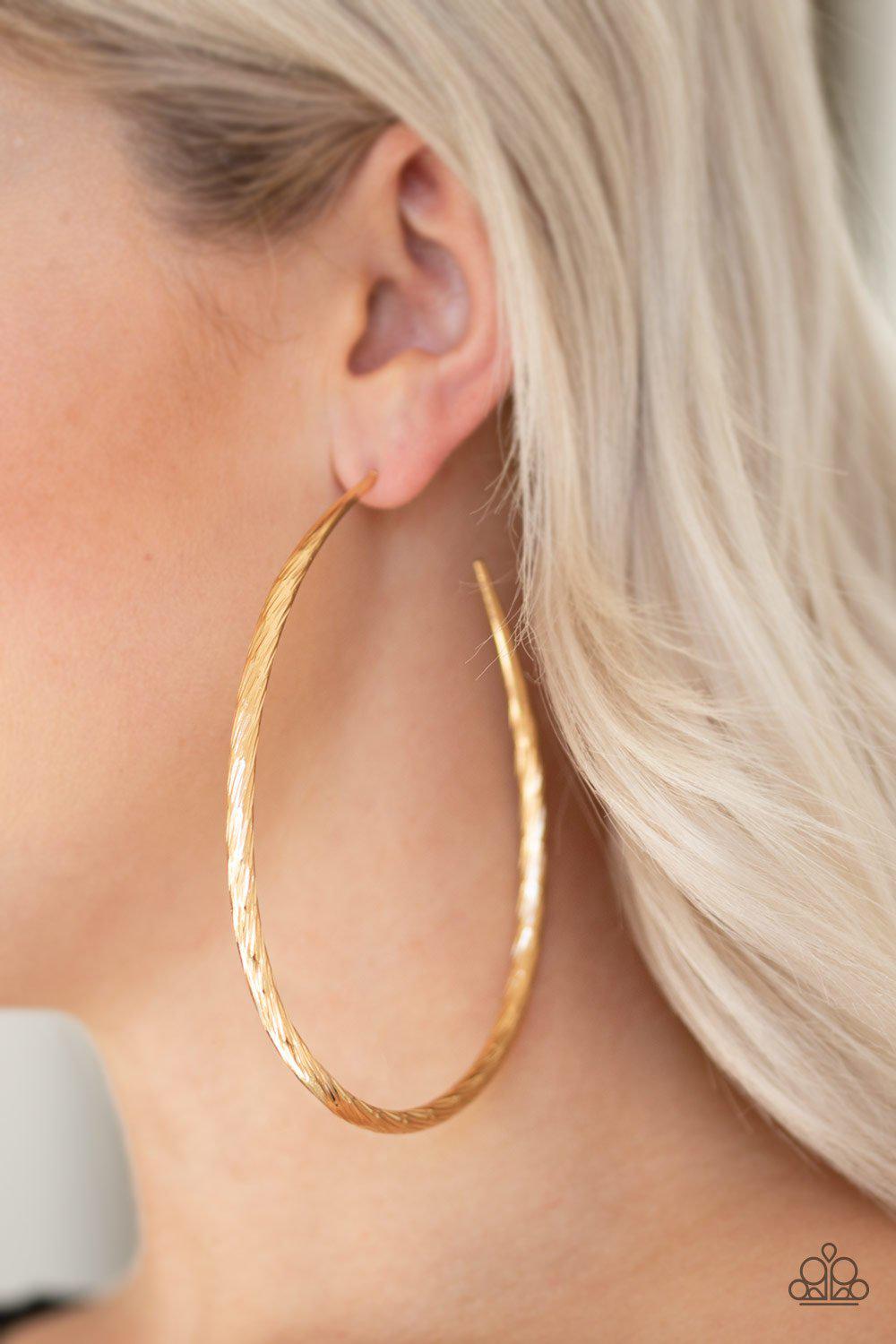 Fleek All Week Gold Hoop Earrings - Paparazzi Accessories- on model - CarasShop.com - Paparazzi Jewelry by Cara Jewels
