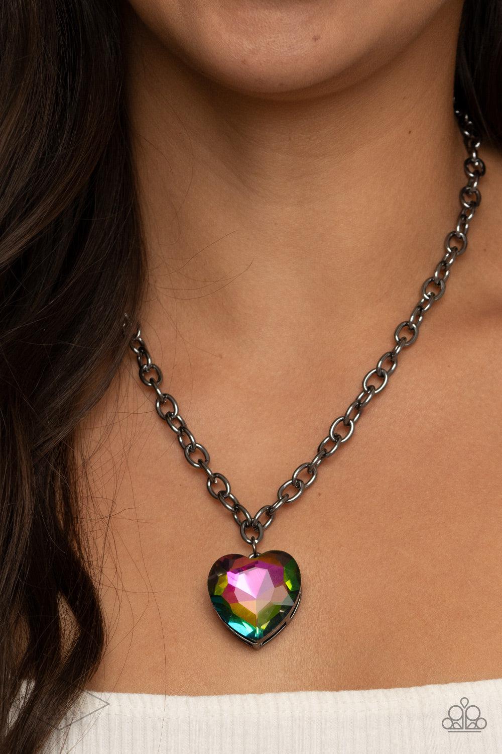 Flirtatiously Flashy Multi Oil Spill Rhinestone Heart Necklace - Paparazzi Accessories- on model - CarasShop.com - Paparazzi Jewelry by Cara Jewels