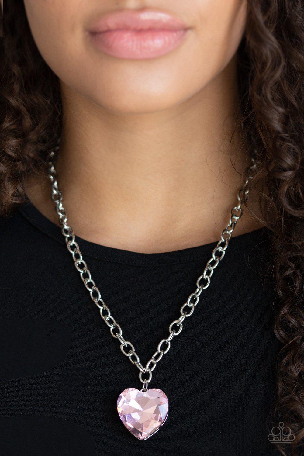 Flirtatiously Flashy Pink Rhinestone Heart Necklace - Paparazzi Accessories- on model - CarasShop.com - Paparazzi Jewelry by Cara Jewels