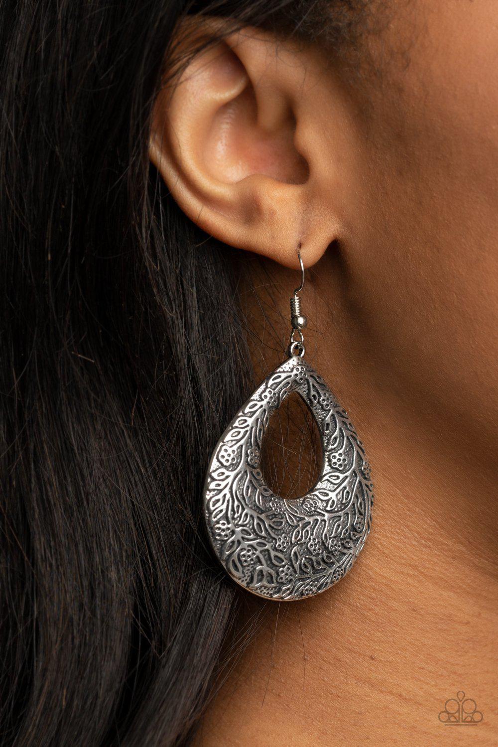Flirtatiously Flourishing Silver Teardrop Earrings - Paparazzi Accessories- on model - CarasShop.com - Paparazzi Jewelry by Cara Jewels