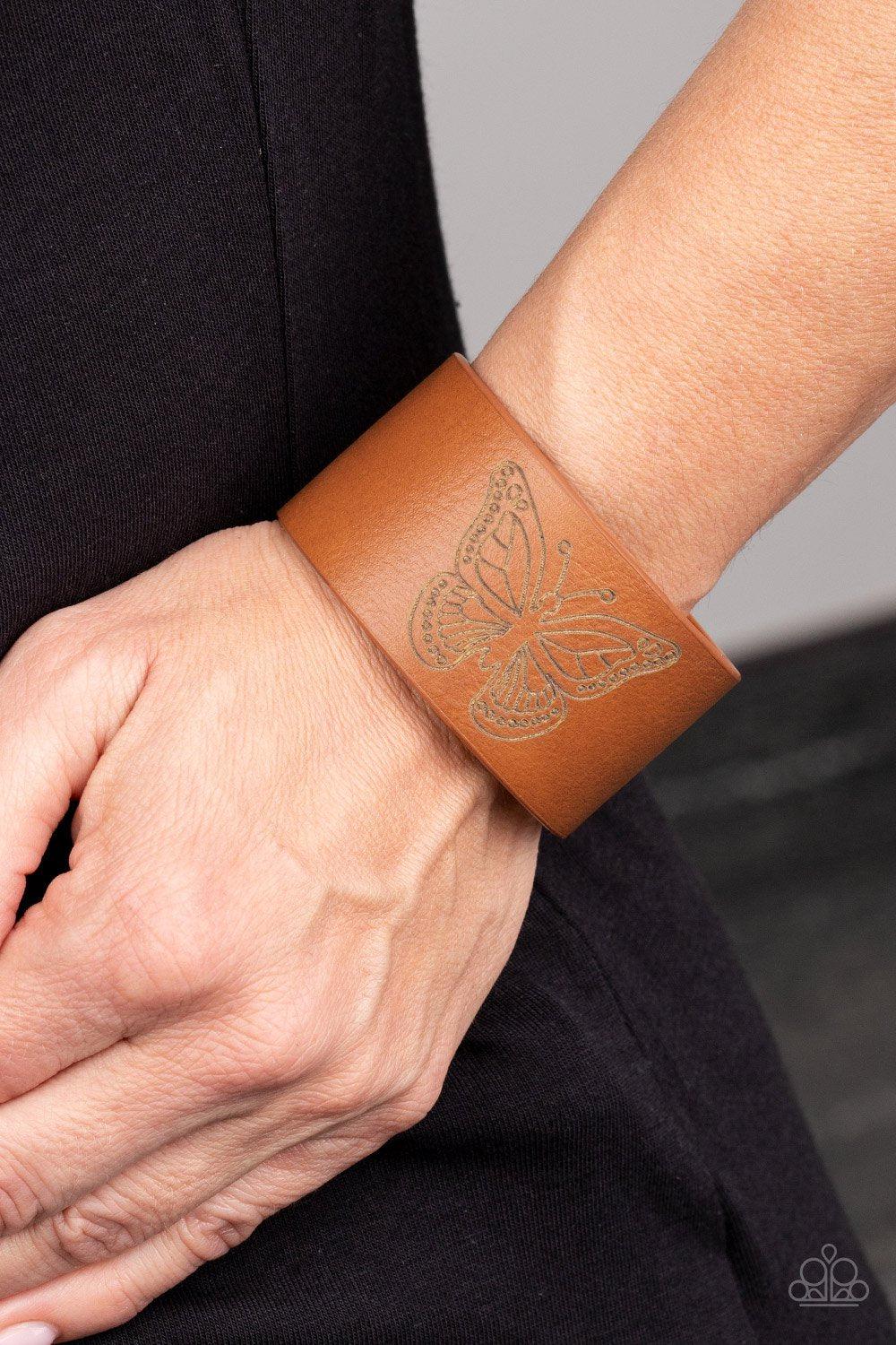 Flirty Flutter Brown Leather Butterfly Urban Wrap Snap Bracelet - Paparazzi Accessories- on model - CarasShop.com - Paparazzi Jewelry by Cara Jewels