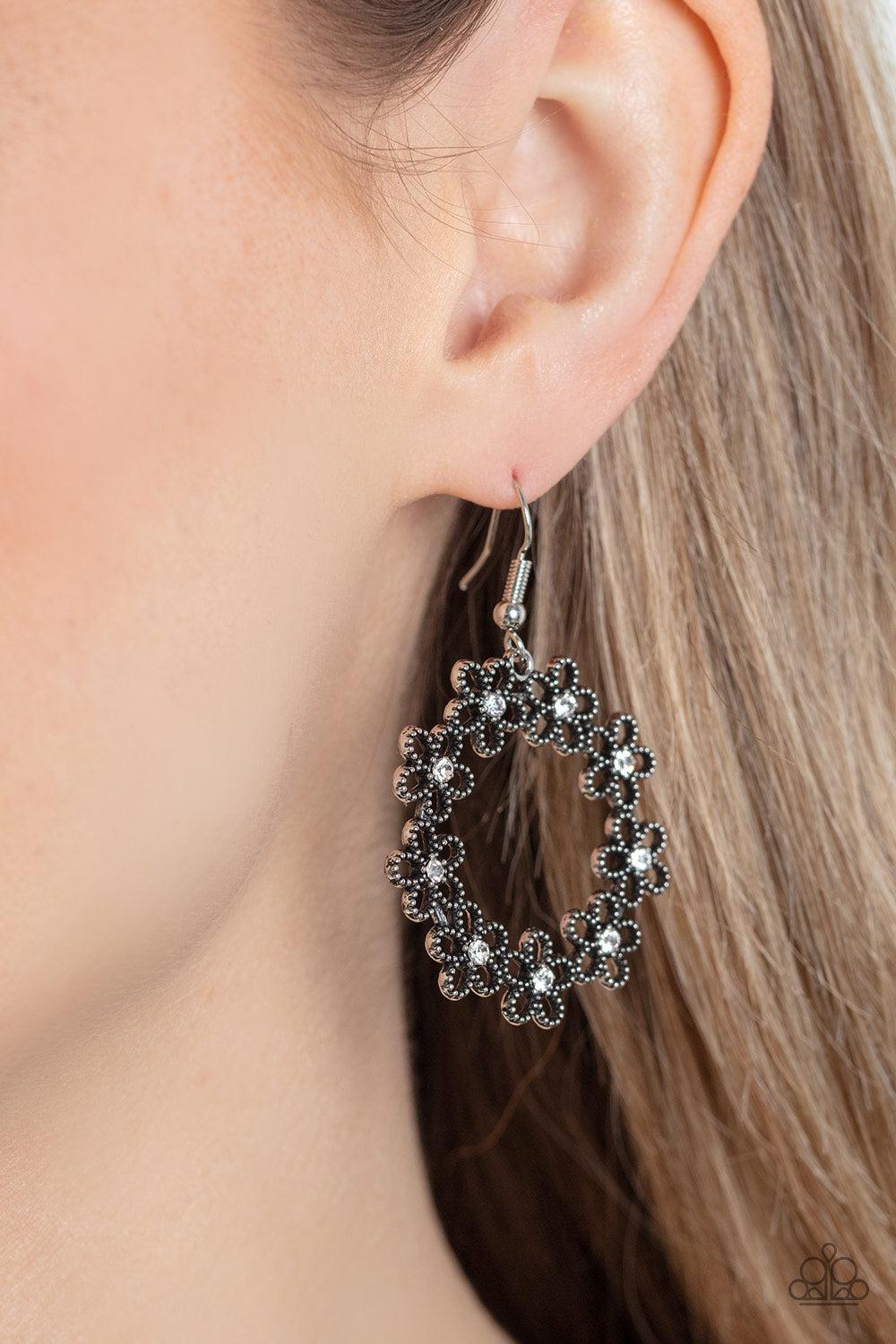 Floral Halos White Earrings - Paparazzi Accessories- on model - CarasShop.com - Paparazzi Jewelry by Cara Jewels