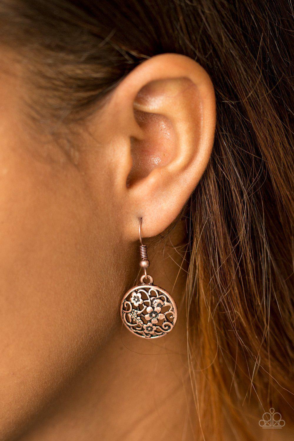 Flower Patch Perfection Copper Earrings - Paparazzi Accessories- on model - CarasShop.com - Paparazzi Jewelry by Cara Jewels