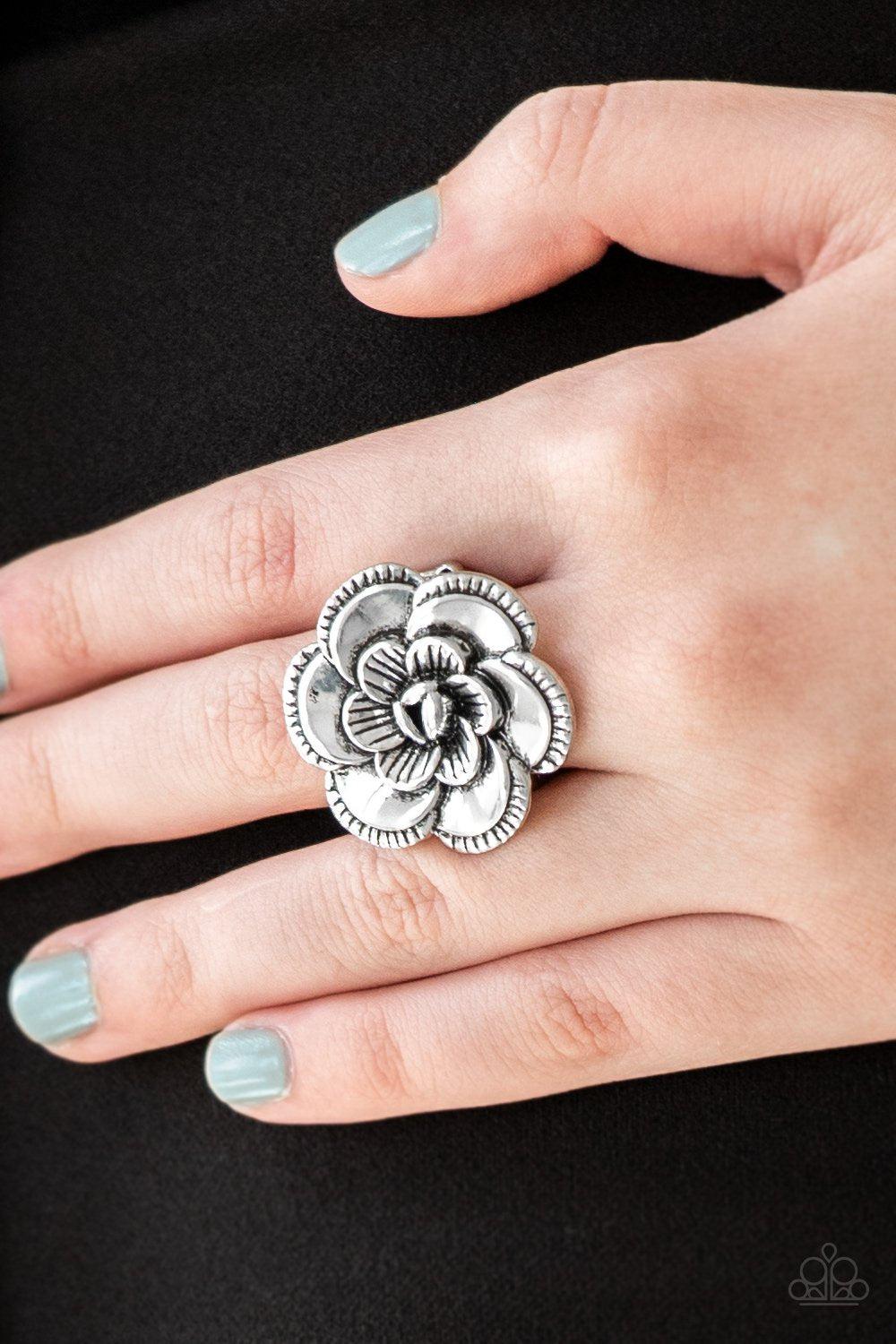 FLOWERBED and Breakfast Silver Flower Ring - Paparazzi Accessories- on model - CarasShop.com - Paparazzi Jewelry by Cara Jewels