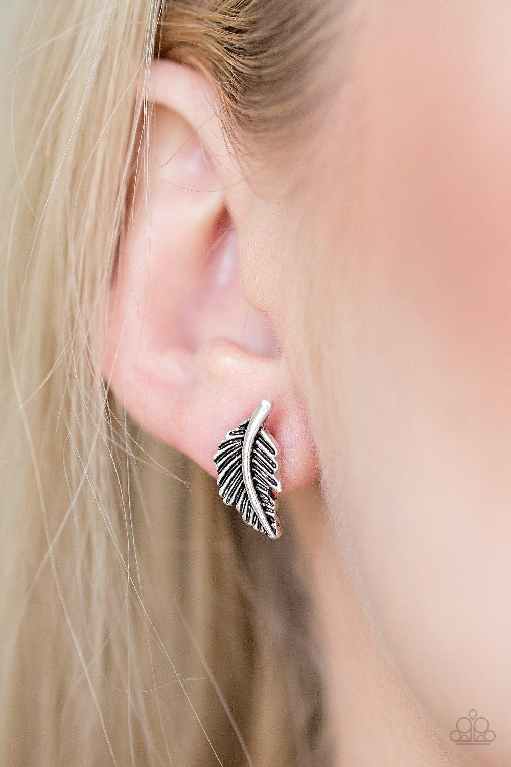 Flying Feathers Silver Feather Earrings - Paparazzi Accessories- on model - CarasShop.com - Paparazzi Jewelry by Cara Jewels