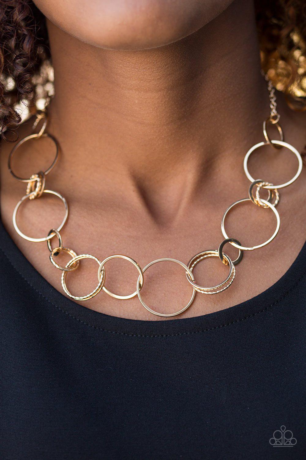 Follow The Ringleader Gold Necklace - Paparazzi Accessories- on model - CarasShop.com - Paparazzi Jewelry by Cara Jewels