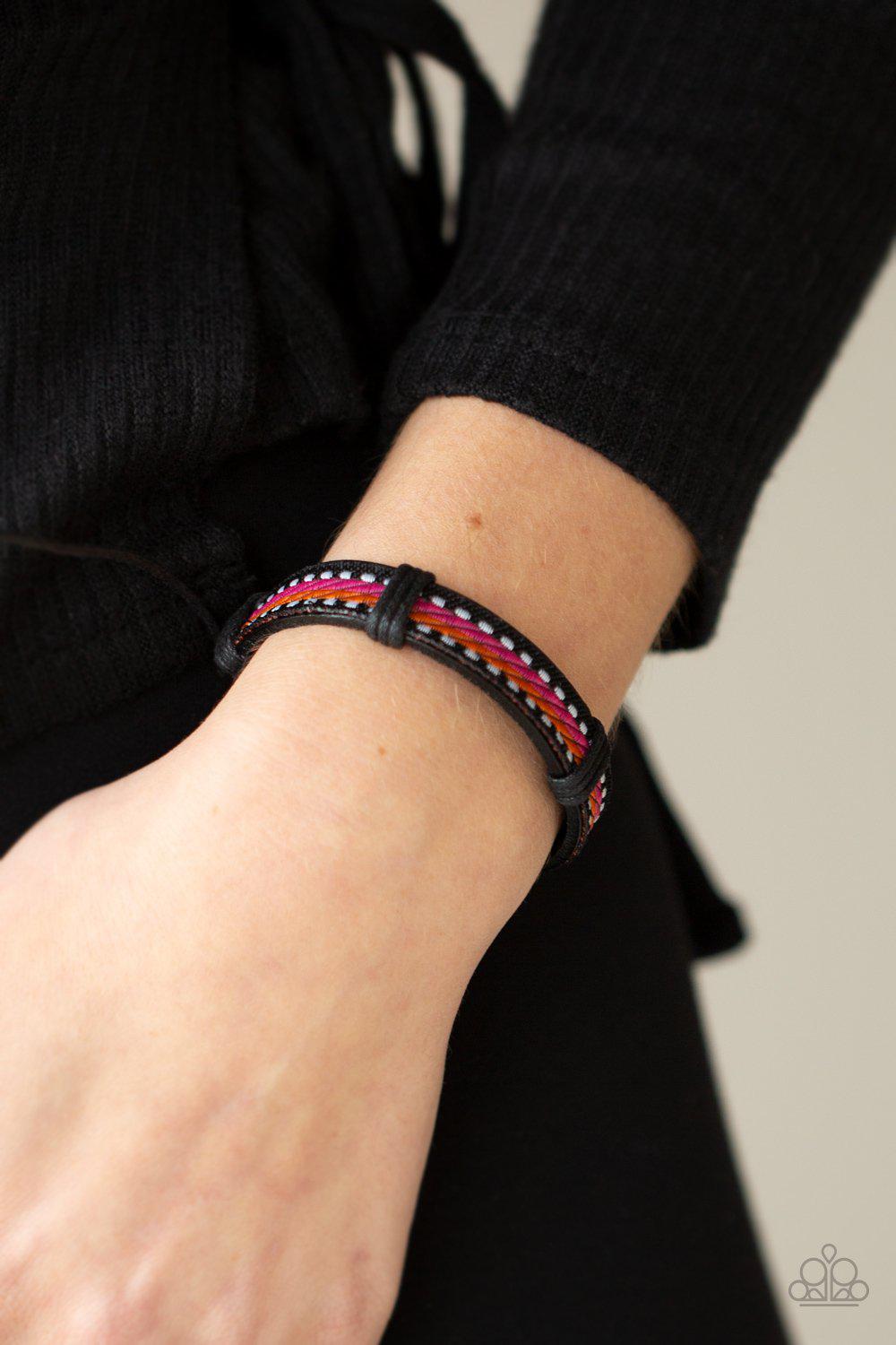 Forging a Trail Orange, Pink and Brown Leather Urban Knot Bracelet - Paparazzi Accessories- on model - CarasShop.com - Paparazzi Jewelry by Cara Jewels