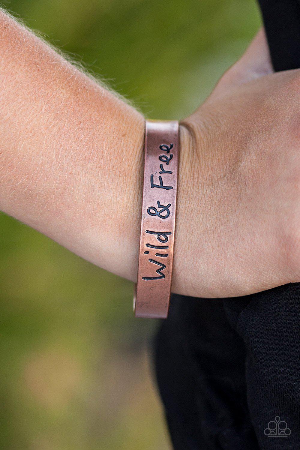 Free To Be Wild Copper Inspirational Cuff Bracelet - Paparazzi Accessories- on model - CarasShop.com - Paparazzi Jewelry by Cara Jewels