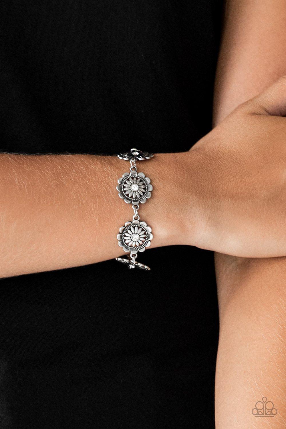 Funky Flower Child White Flower Bracelet - Paparazzi Accessories- on model - CarasShop.com - Paparazzi Jewelry by Cara Jewels