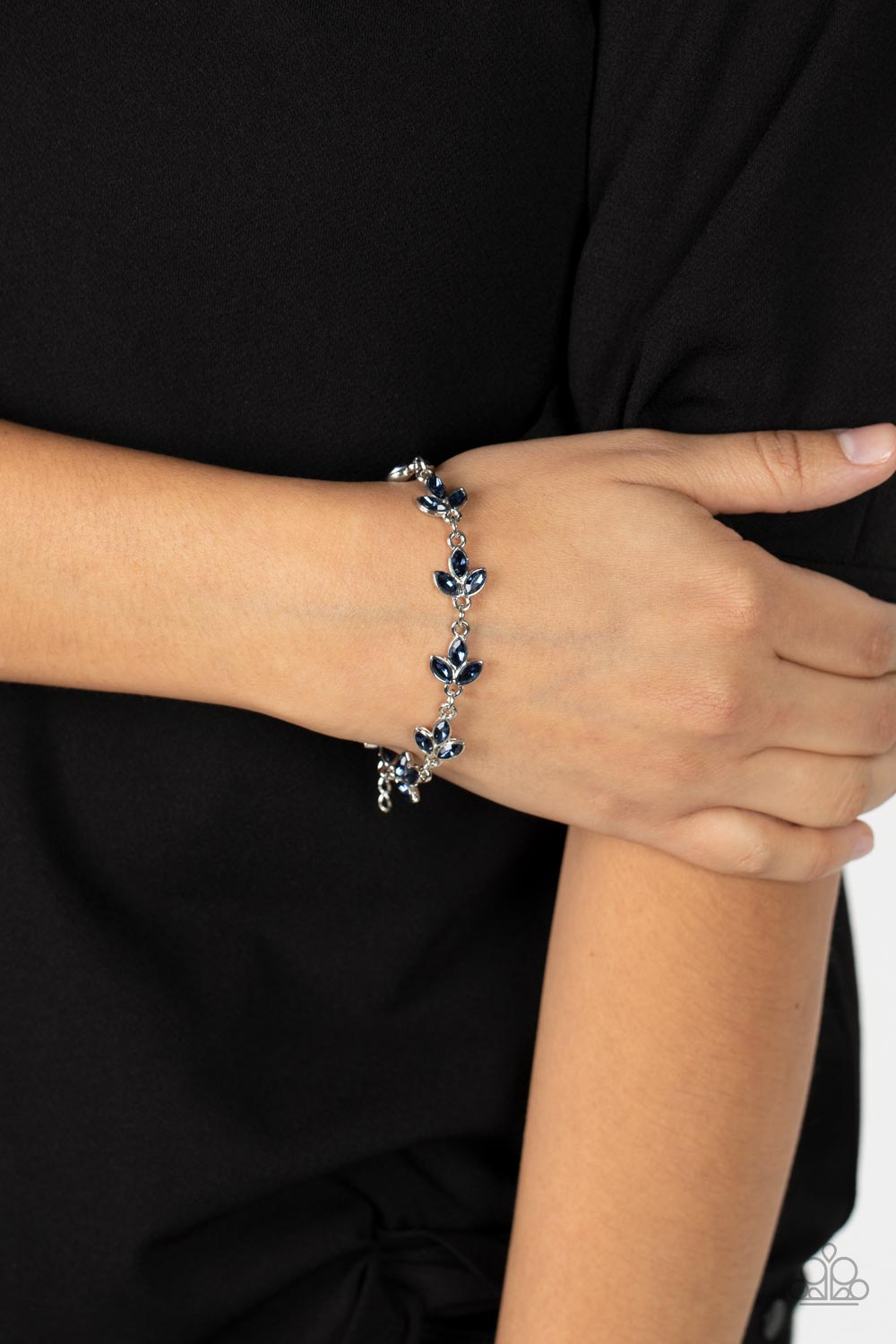 Gala Garland Blue Rhinestone Bracelet - Paparazzi Accessories- on model - CarasShop.com - Paparazzi Jewelry by Cara Jewels
