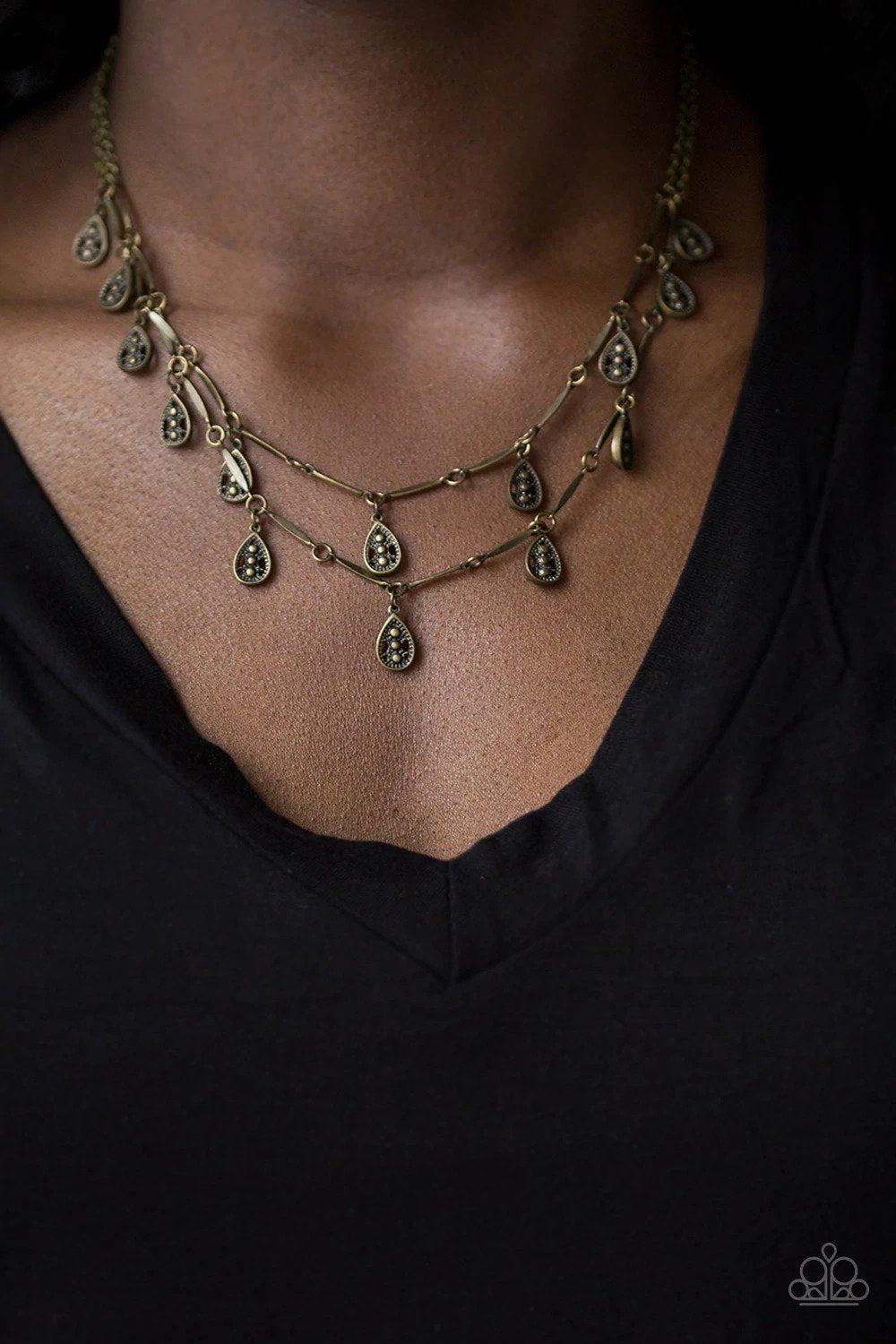 Galapagos Gypsy Brass Necklace - Paparazzi Accessories- on model - CarasShop.com - Paparazzi Jewelry by Cara Jewels