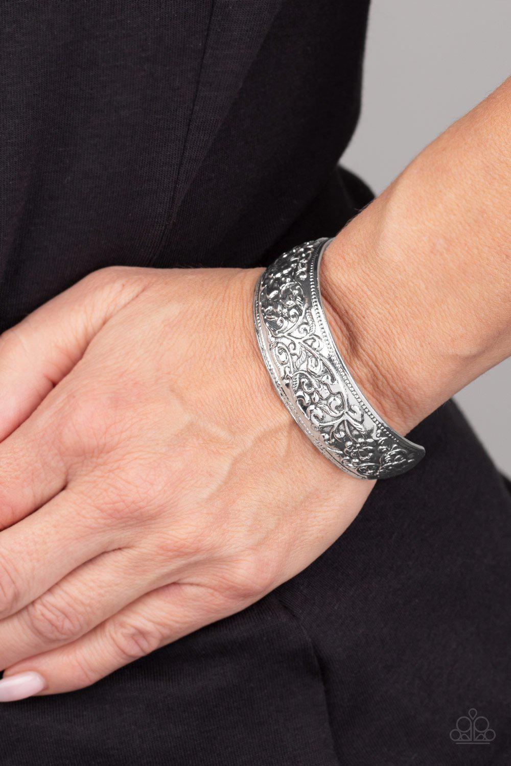 Garden Tropic Silver Floral Cuff Bracelet - Paparazzi Accessories- on model - CarasShop.com - Paparazzi Jewelry by Cara Jewels
