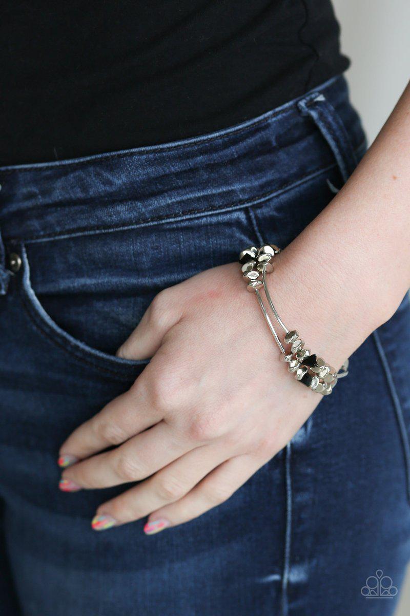 Get the Glow On The Road Black and Silver Bracelet Set - Paparazzi Accessories- on model - CarasShop.com - Paparazzi Jewelry by Cara Jewels
