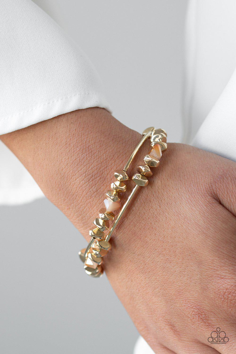 Get The GLOW On The Road Gold Bracelet - Paparazzi Accessories- on model - CarasShop.com - Paparazzi Jewelry by Cara Jewels